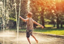 Beaverton extends cooling center hours for heatwave child_playing_fountain_cooling_down