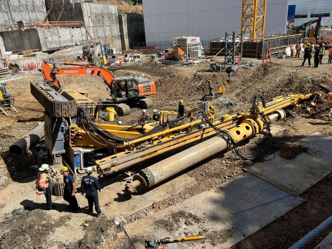 landscape_crane_drilling machine_fell_operator_stuck_drill_site_resized