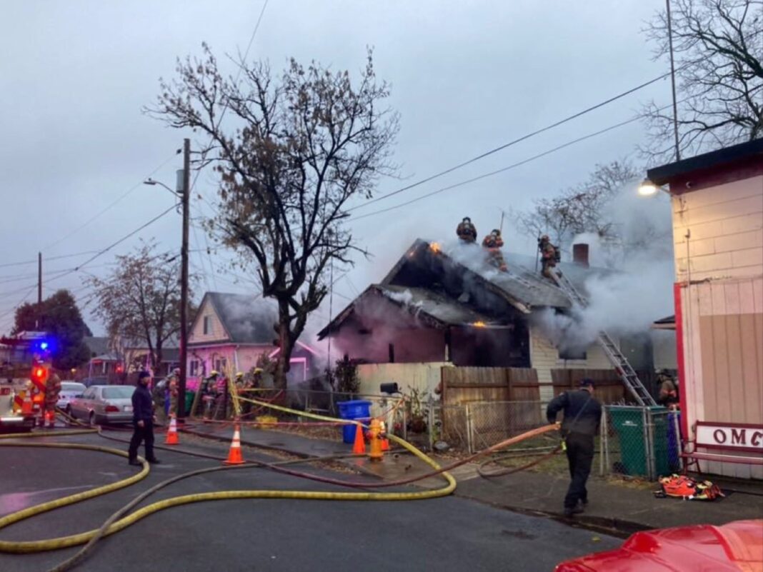 firefighters at the scene in Lents neighborhood