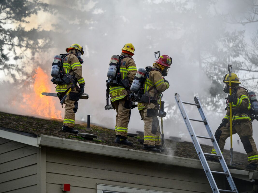 roof of burning apartment complex