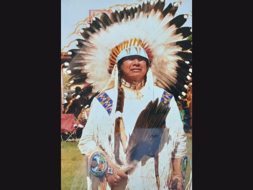 Wilson Wewa in traditional native american clothing