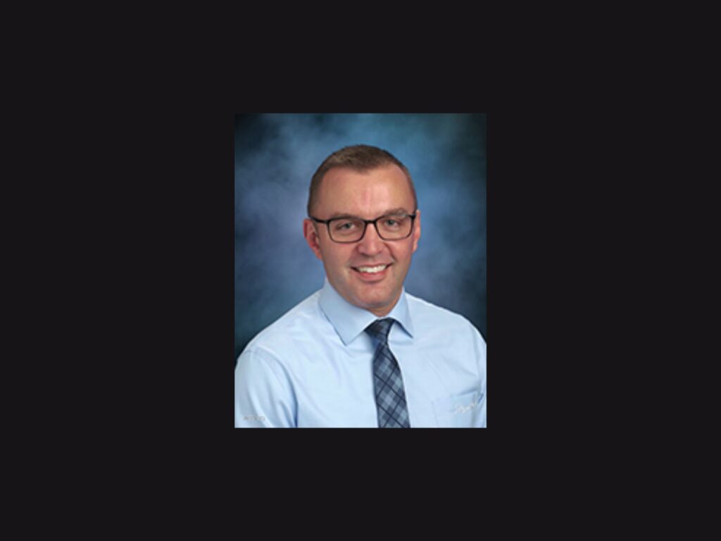 Travis Reiman superintendent candidate