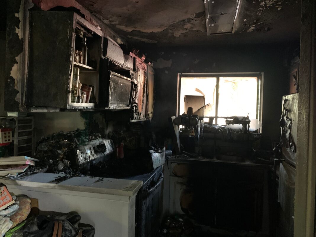 inside of kitchen after apartment fire multiple pets died