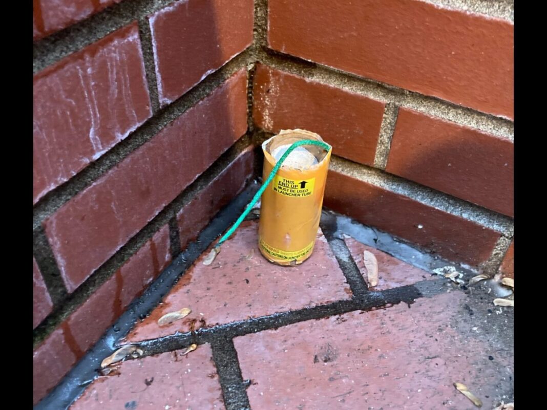 undetonated firework used by protestors